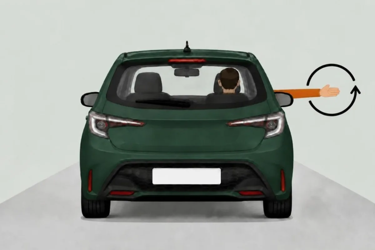 Driver's right arm out of the window, moving in an anticlockwise circle, seen from behind